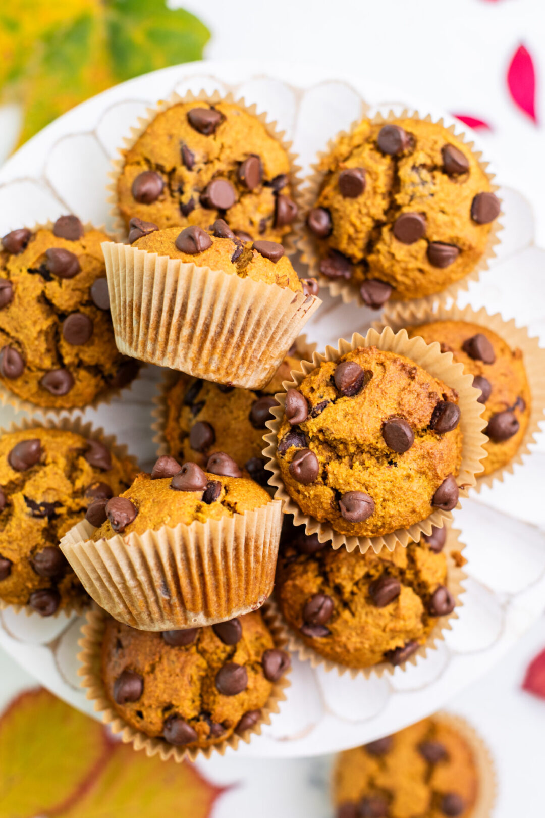 pumpkin chocolate chip muffins stacked up