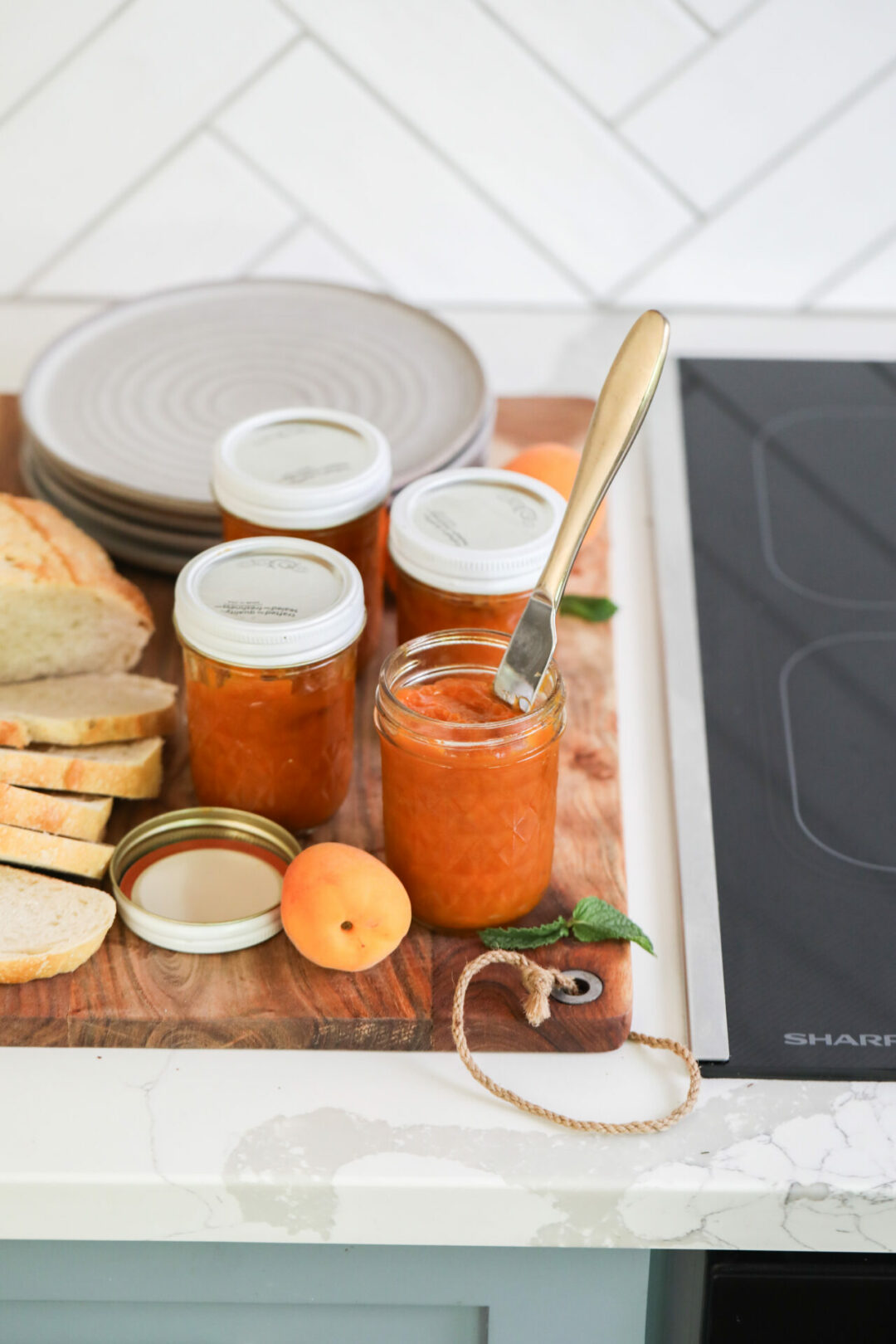 Sunkissed Kitchen's apricot jam recipe on the Sharp 30 in. Induction Cooktop with Side Accessories (SCH3043GB).