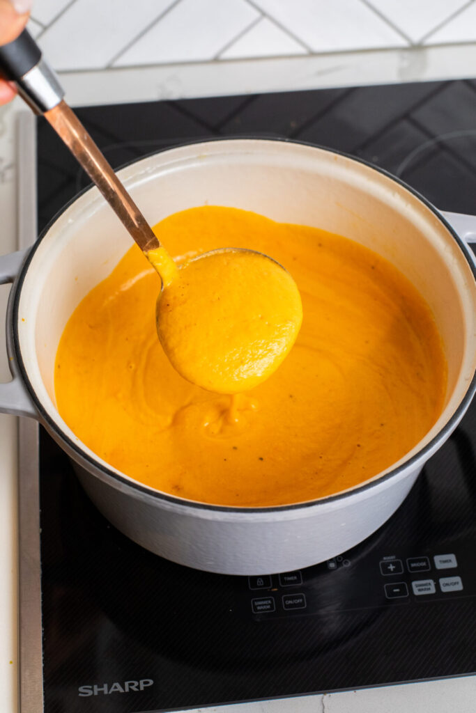 Butternut squash red pepper soup on a Sharp Cooktop