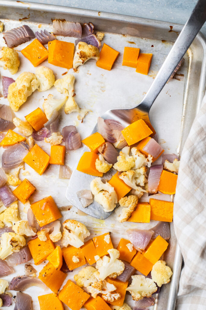 Roasted Squash, red onion, and cauliflower in a pan
