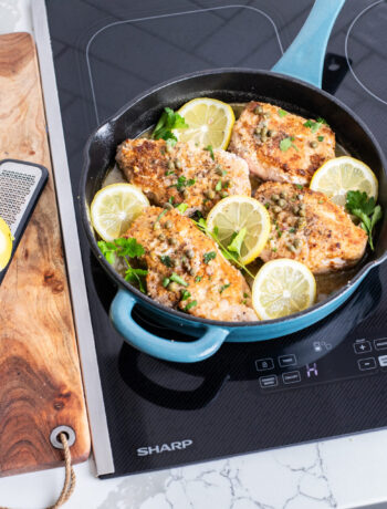 Pork piccata in a pan on a Sharp induction cooktop