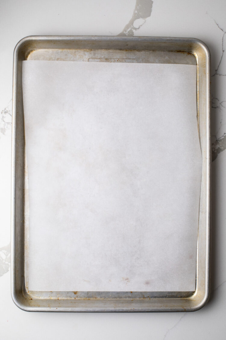 Sheet pan lined with parchment paper