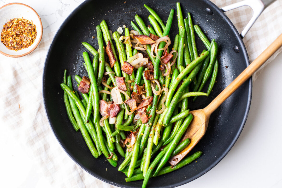 Bacon Green beans in a frying pan on a sharp induction cooktop