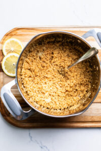  tossing quinoa with the lemon dressing.