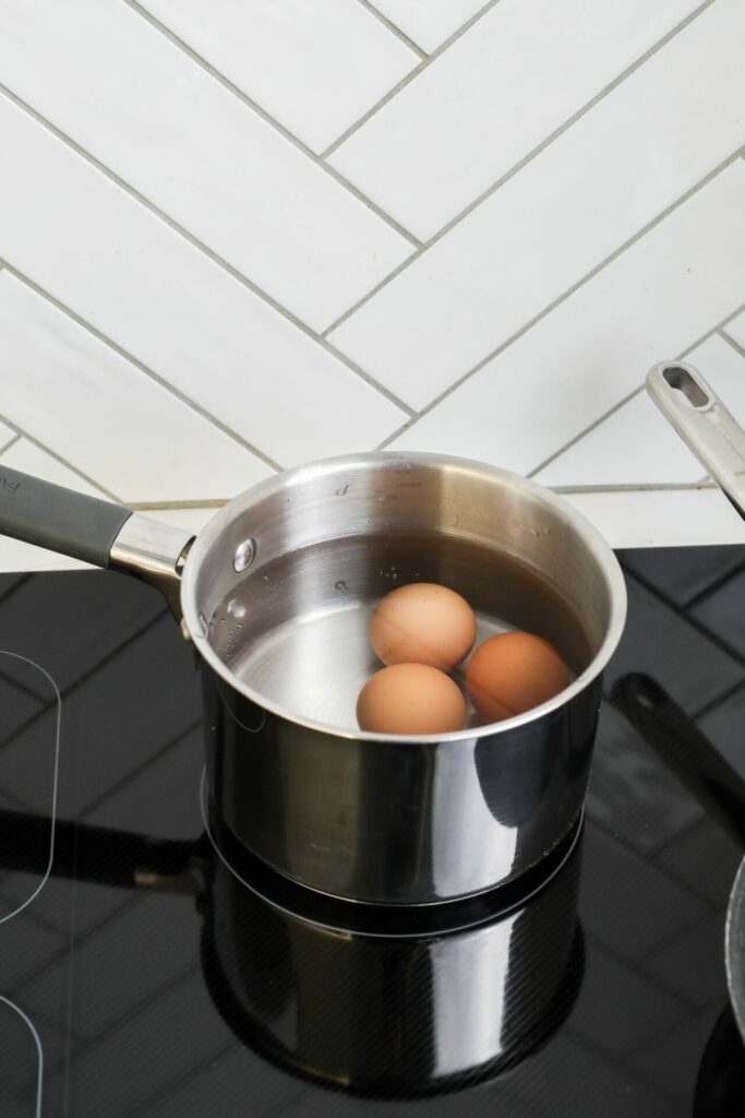 Hard boiled eggs cooking in a pot on a Sharp Induction Cooktop SCH3042GB