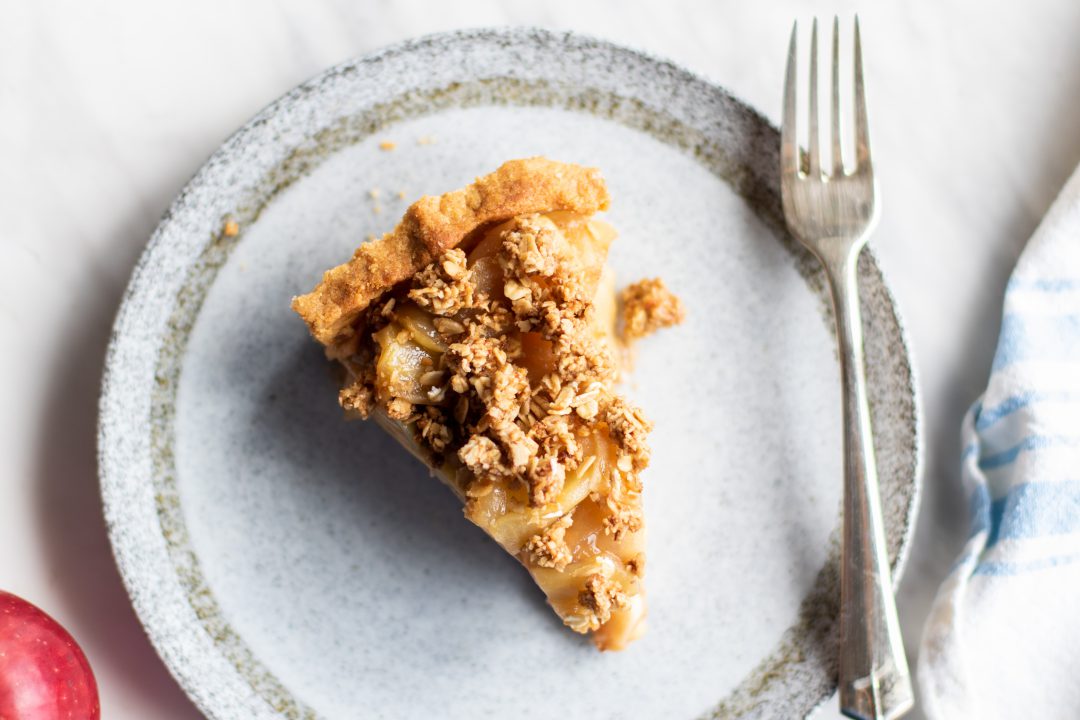 slice of apple pie on a plate