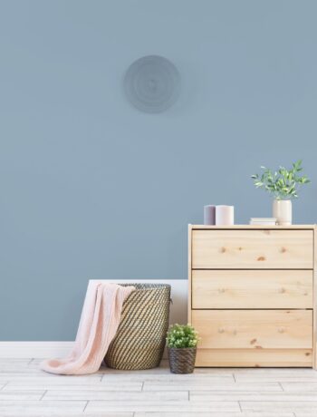 air purifier in a room next to dresser