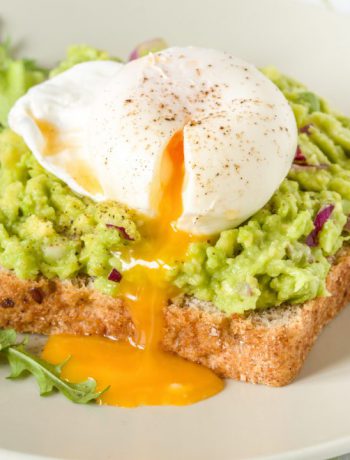 Breakfast egg dish on a blue cloth.