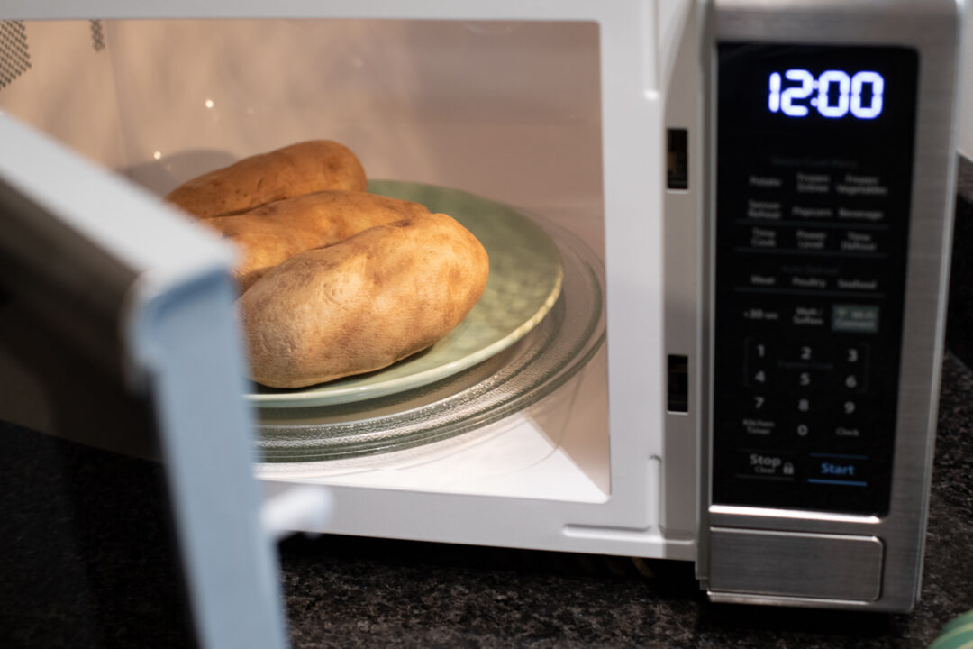 large potatoes in a microwave