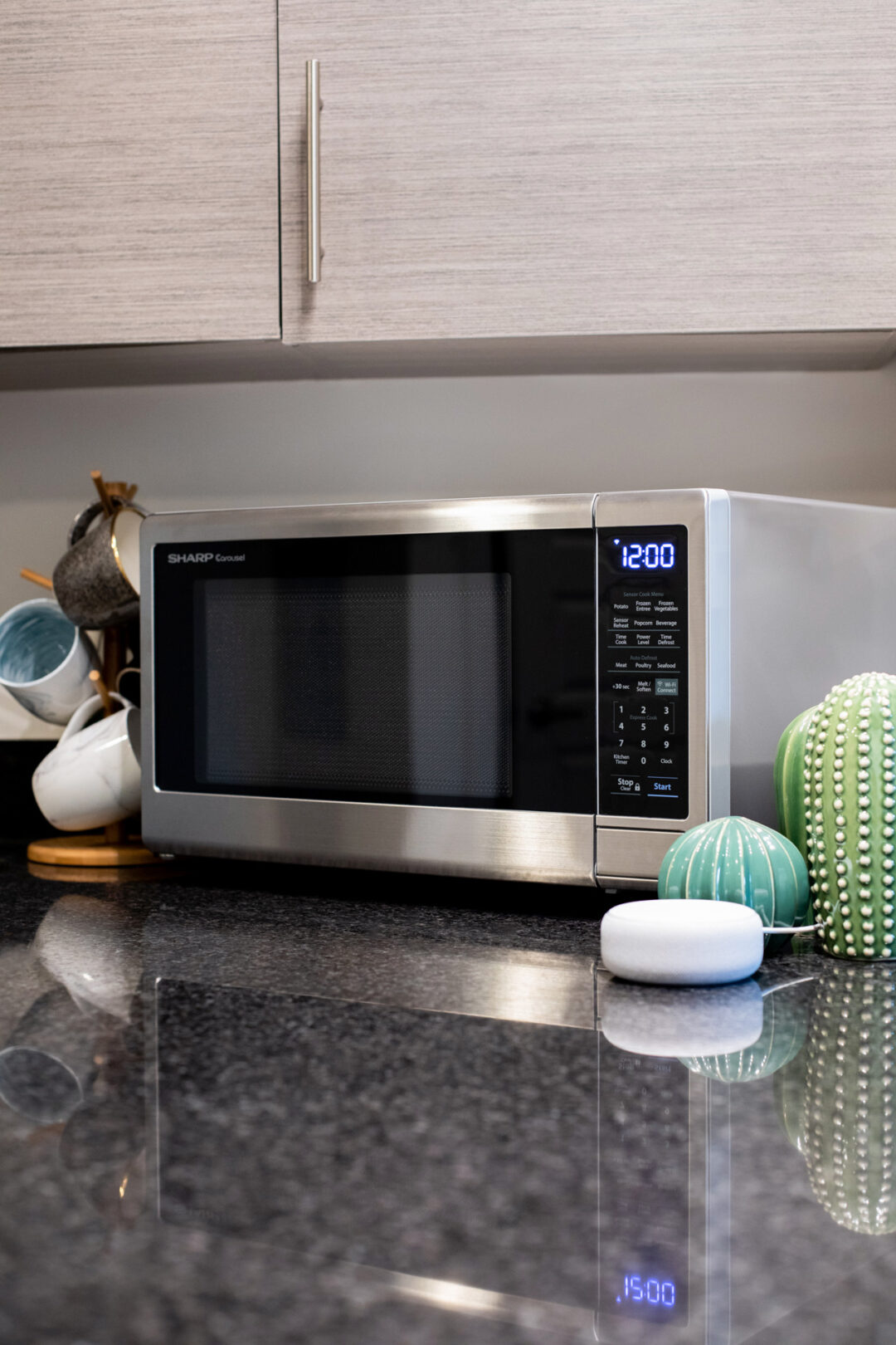Sharp microwave on a countertop with Amazon Echo