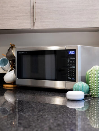 Sharp microwave on a countertop with Amazon Echo