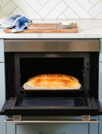 bread in an open Sharp SuperSteam+ built-in oven