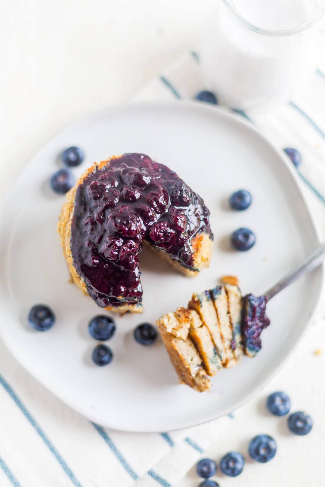 Gluten-free Coconut Flour Pancakes with Blueberry Syrup on a plate