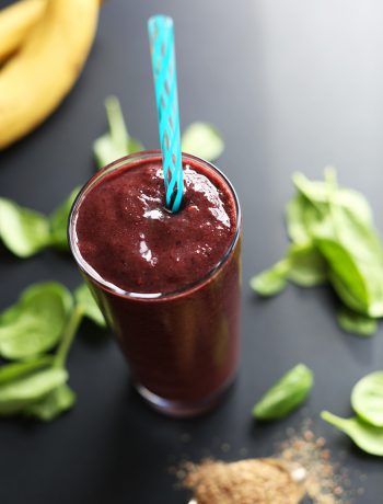 A smoothie with a straw.