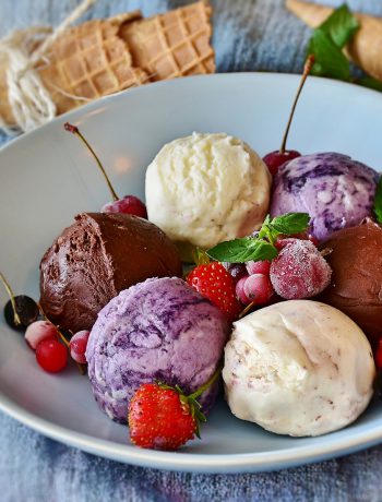 Ice cream plate with an array of fruits.