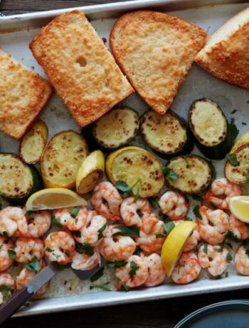 Sheetpan Shrimp Scampi spread out on a pan.