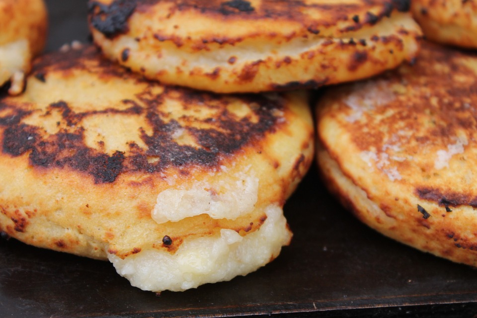 Arepas stacked upon one another.