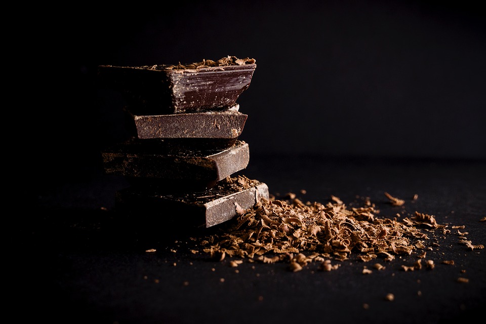 Dark chocolate stacked upon one another.
