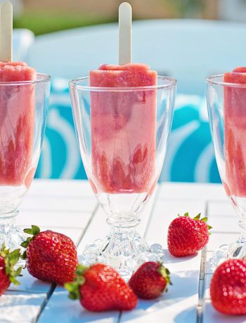 Three frozen strawberry drinks.