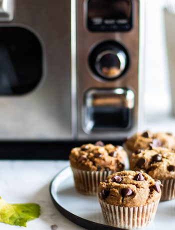 Chocolate chip muffins next to a Sharp Supersteam Countertop Oven.