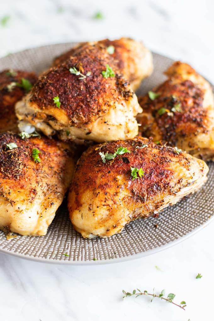 Oven Baked Chicken Thighs on a plate.