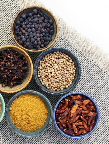 Seasonings and spices in bowls.