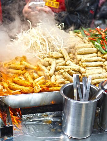 An array of foods at a street fair.