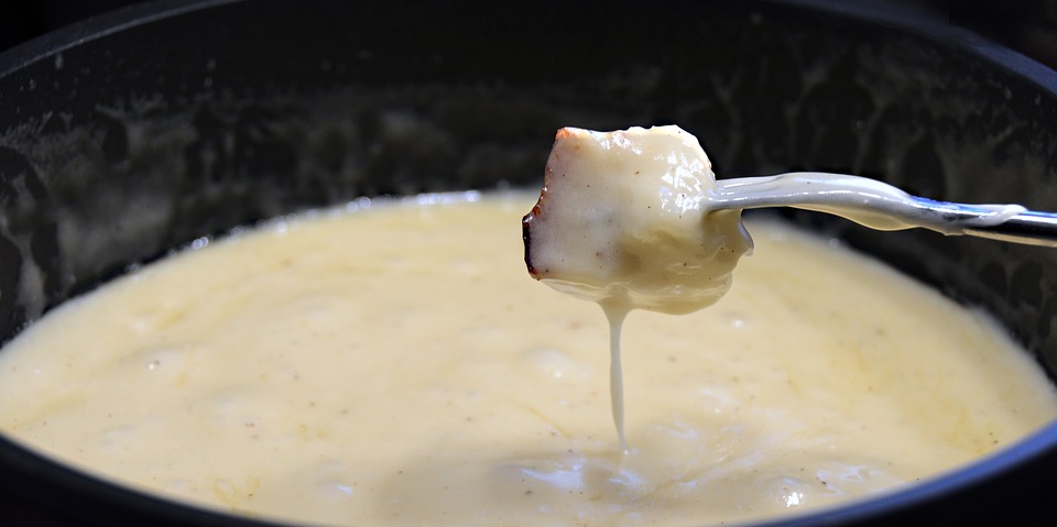 Swiss fondue in a pan.
