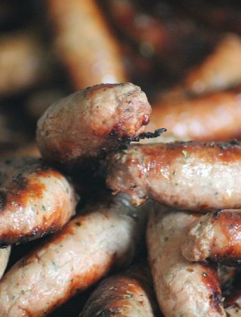 Close-up image of sausage stacked upon one another.