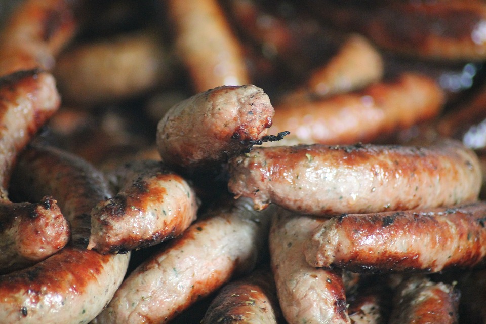 Close-up image of sausage stacked upon one another.
