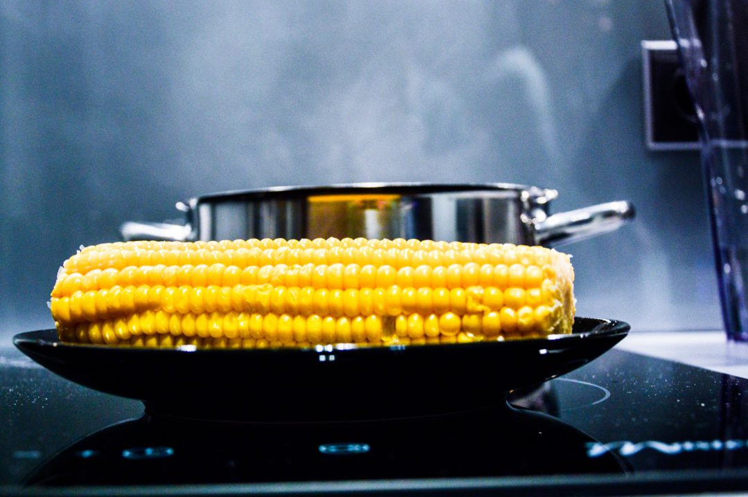 Corn being cooked on a Sharp Induction Cooktop.