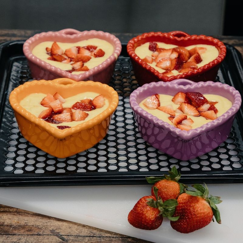 Heart shaped strawberru short cakes being prepare to enter a Sharp Supersteam Countertop Oven.