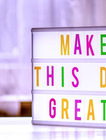 "Make this a Great Day" quoter decor in a room.