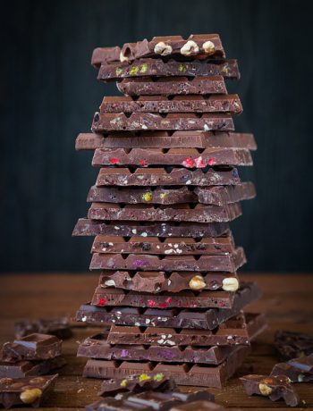 Homemade chocolate stacked upon one another.