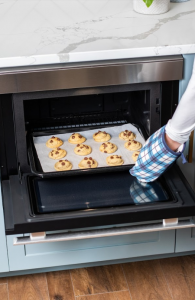 A tray of cookies inside a Sharp SuperSteam+™ Built-In Wall Oven (SSC2489DS)