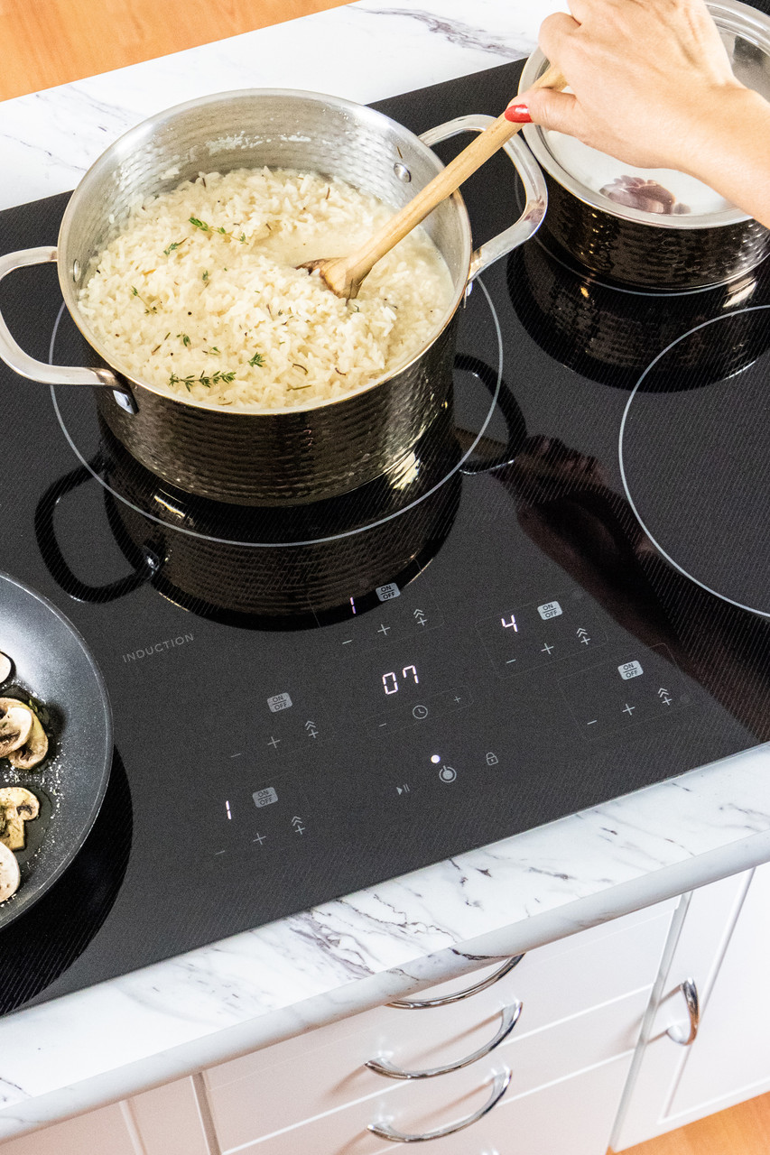 36-Inch Black Cooktop (SDH3652DB) – preparing rice on the Sharp 36”  cooktop