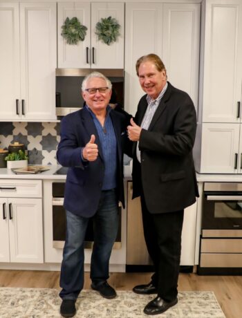 Peter Weedfald and Eric Schwartz at the SHARP HQ in Montvale, NJ in front of the 24 inch appliance suite.