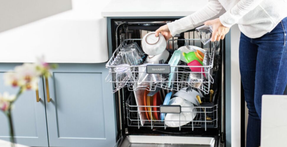 Person using a Sharp Smart Dishwasher