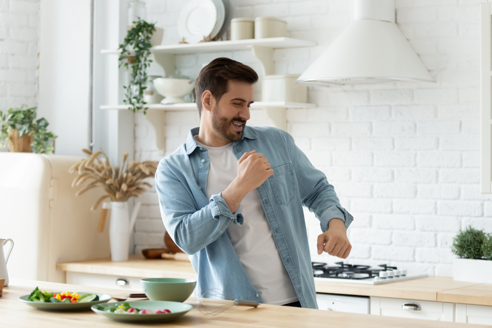 man cooking in a kitchen