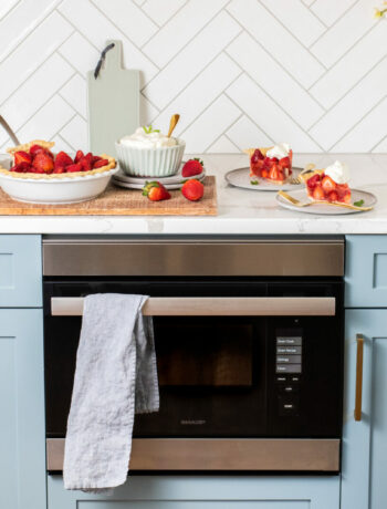 Kitchen with oven and strawberry pie