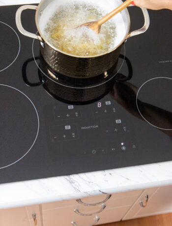 pot of pasta boiling on induction cooktop