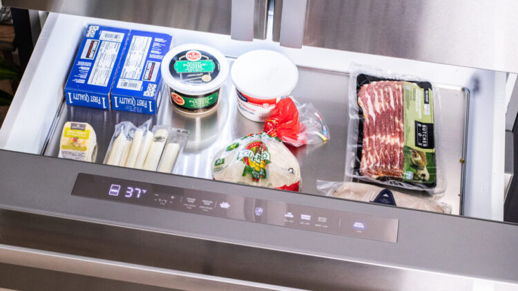 food and ingredients in a fridge drawer