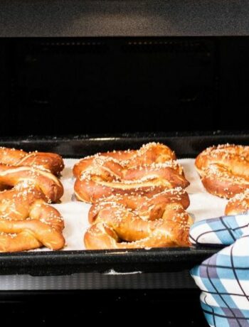 pretzels being taken out of oven