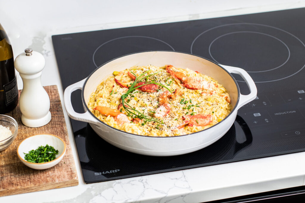 Lobster risotto cooking on a Sharp induction cooktop