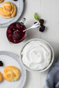 blackberry sauce and whipped cream for Cream Puffs 