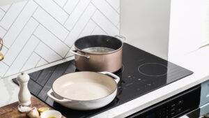 pots on a sharp cooktop