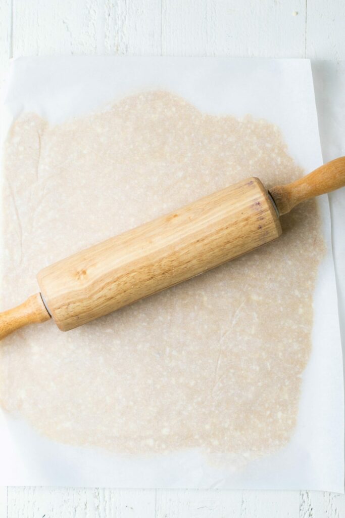 dough rolled out with a rolling pin