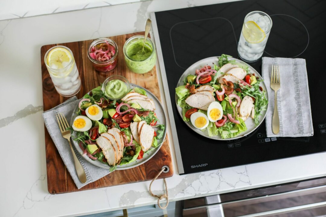 Cobb salads plated on a Sharp Induction Cooktop SCH3042GB