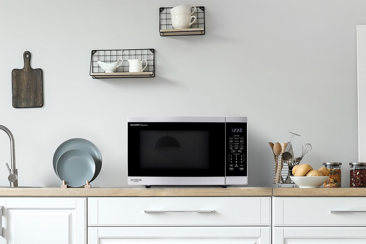 Sharp 1.4 cu. ft. 1100W Stainless Steel Countertop Microwave Oven with Inverter Technology (SMC1465KM) lifestyle