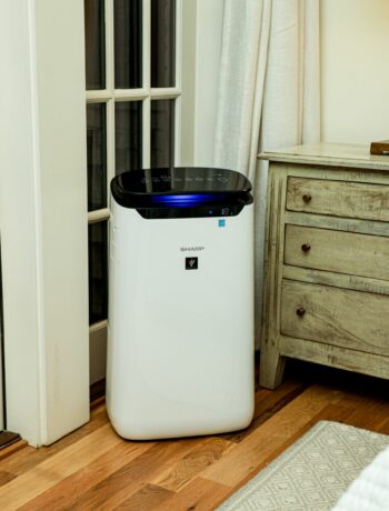air purifier in a room with hardwood floor